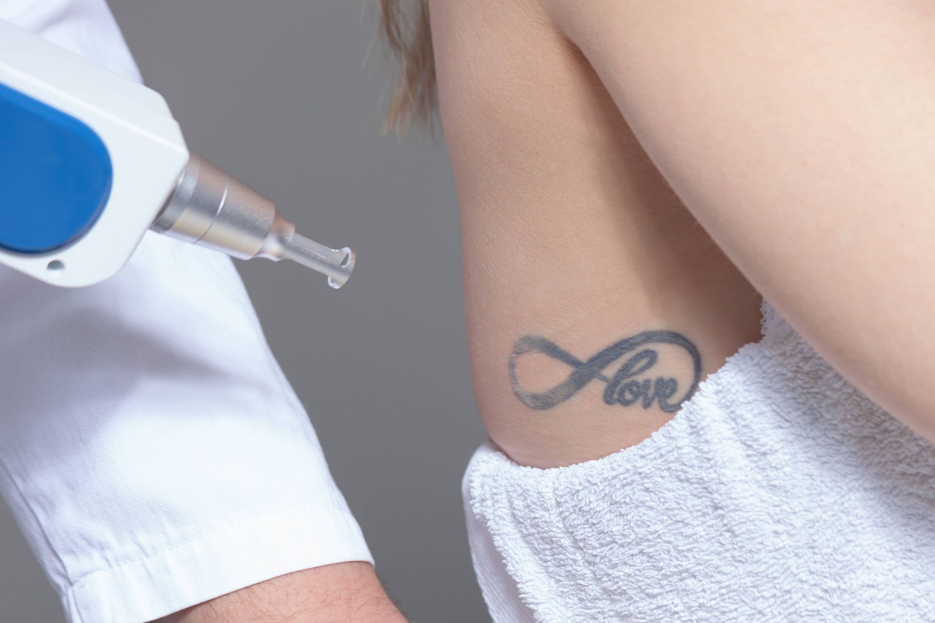 Laser tattoo removal with a specialist at Lexington Tattoo Removal near Lexington, KY