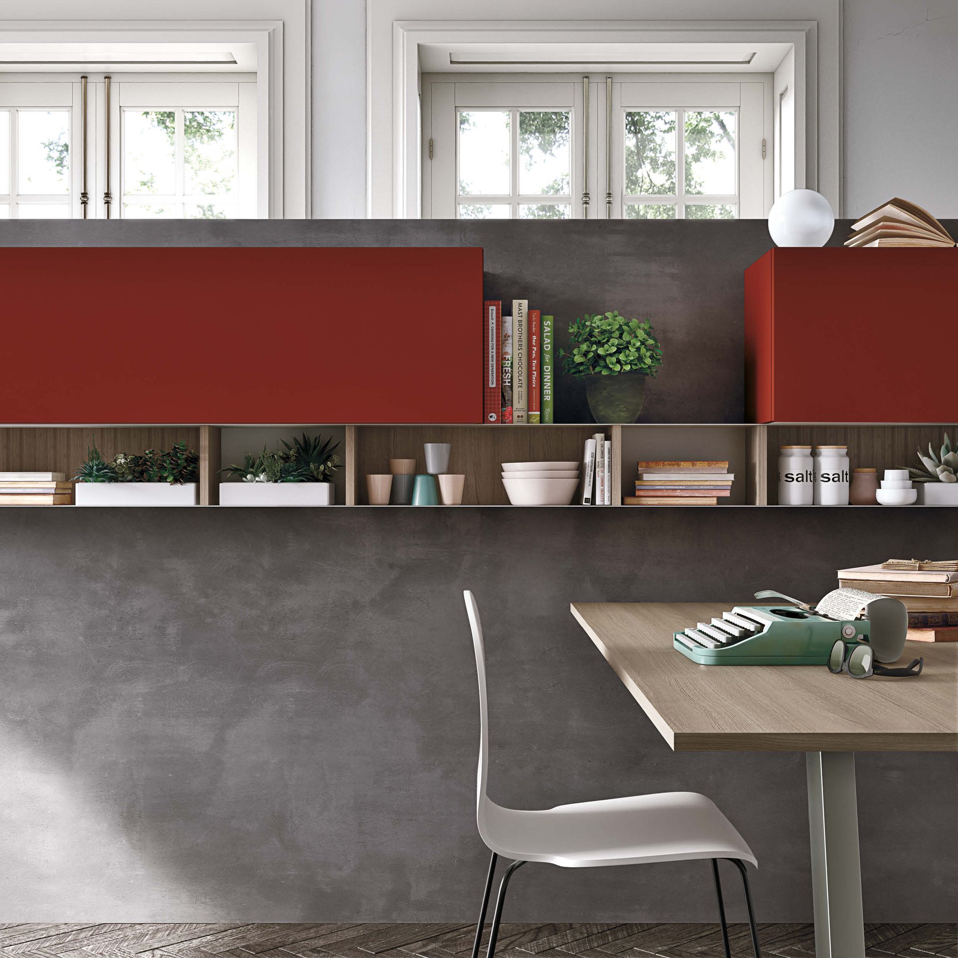 Una scrivania con sopra una macchina da scrivere e una sedia