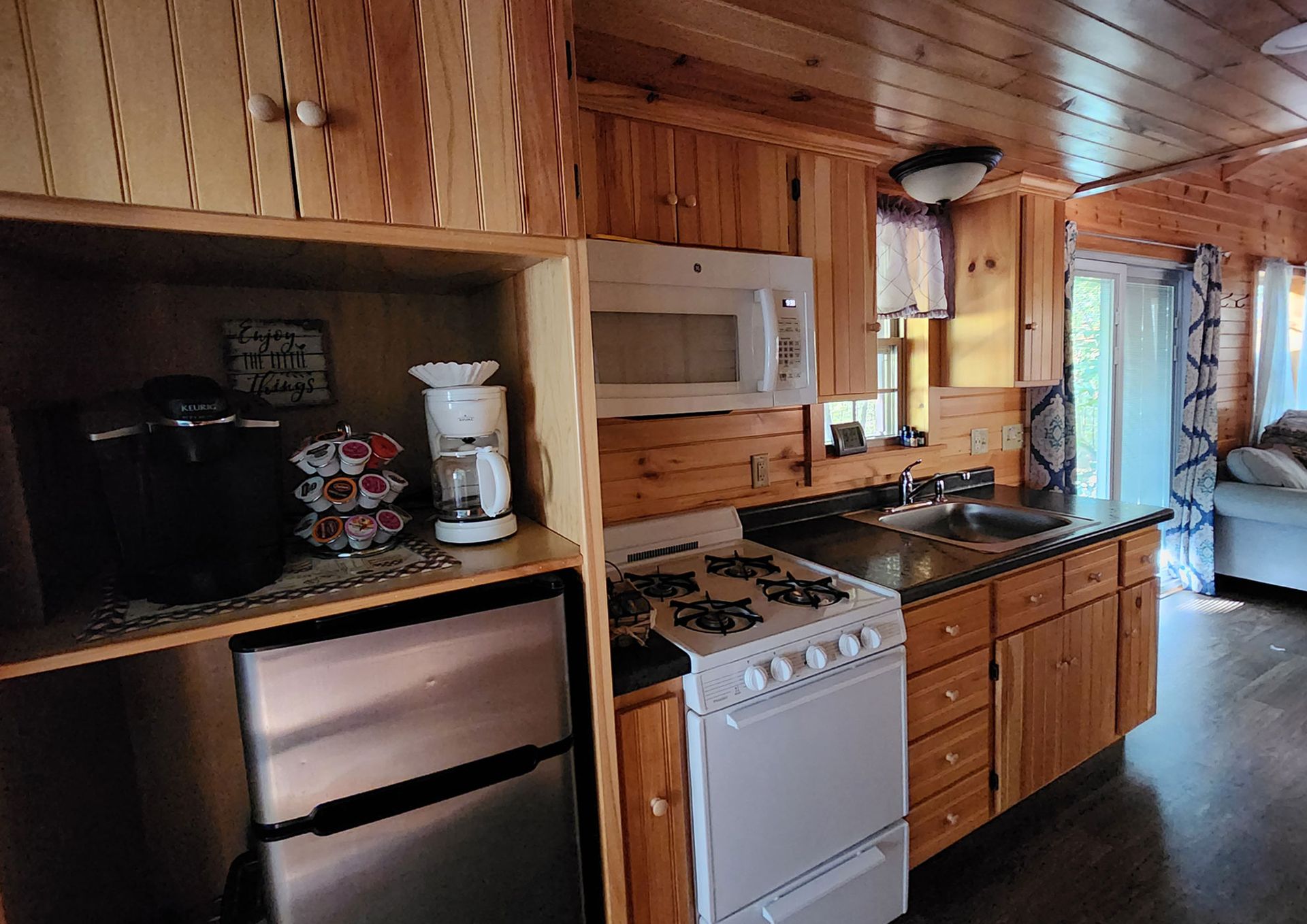 Packed with cabin comforts like a refrigerator, stove, oven and fully stocked kitchen