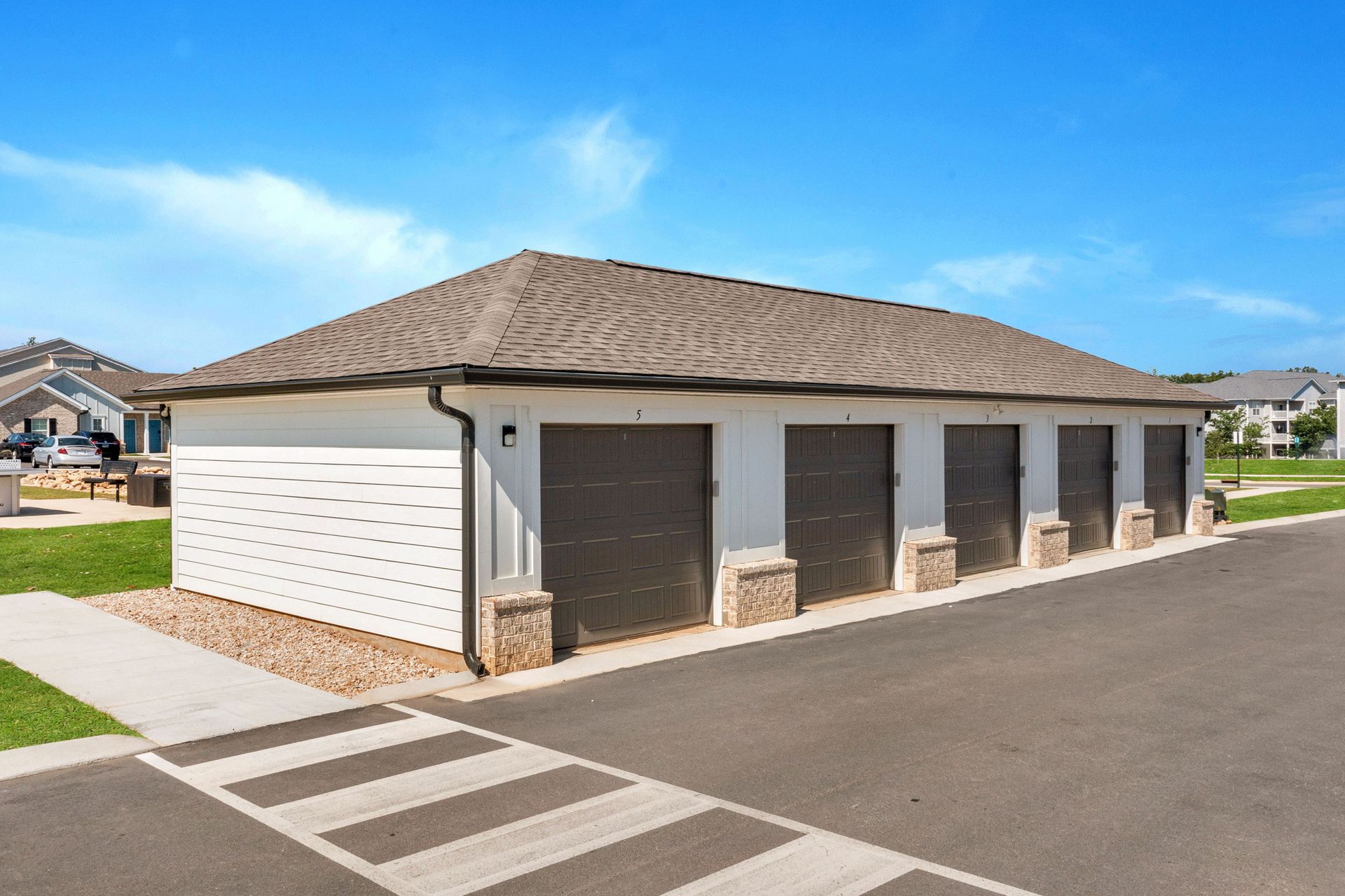 A row of garages are lined up on the side of a road at Ashford Villas in Chattanooga, TN.