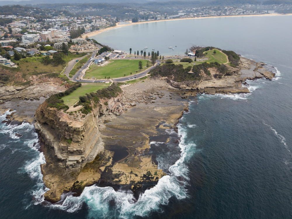 An Aerial View of a Small Island in the Middle of the Ocean — NLJ Partners P/L In Wyong, NSW
