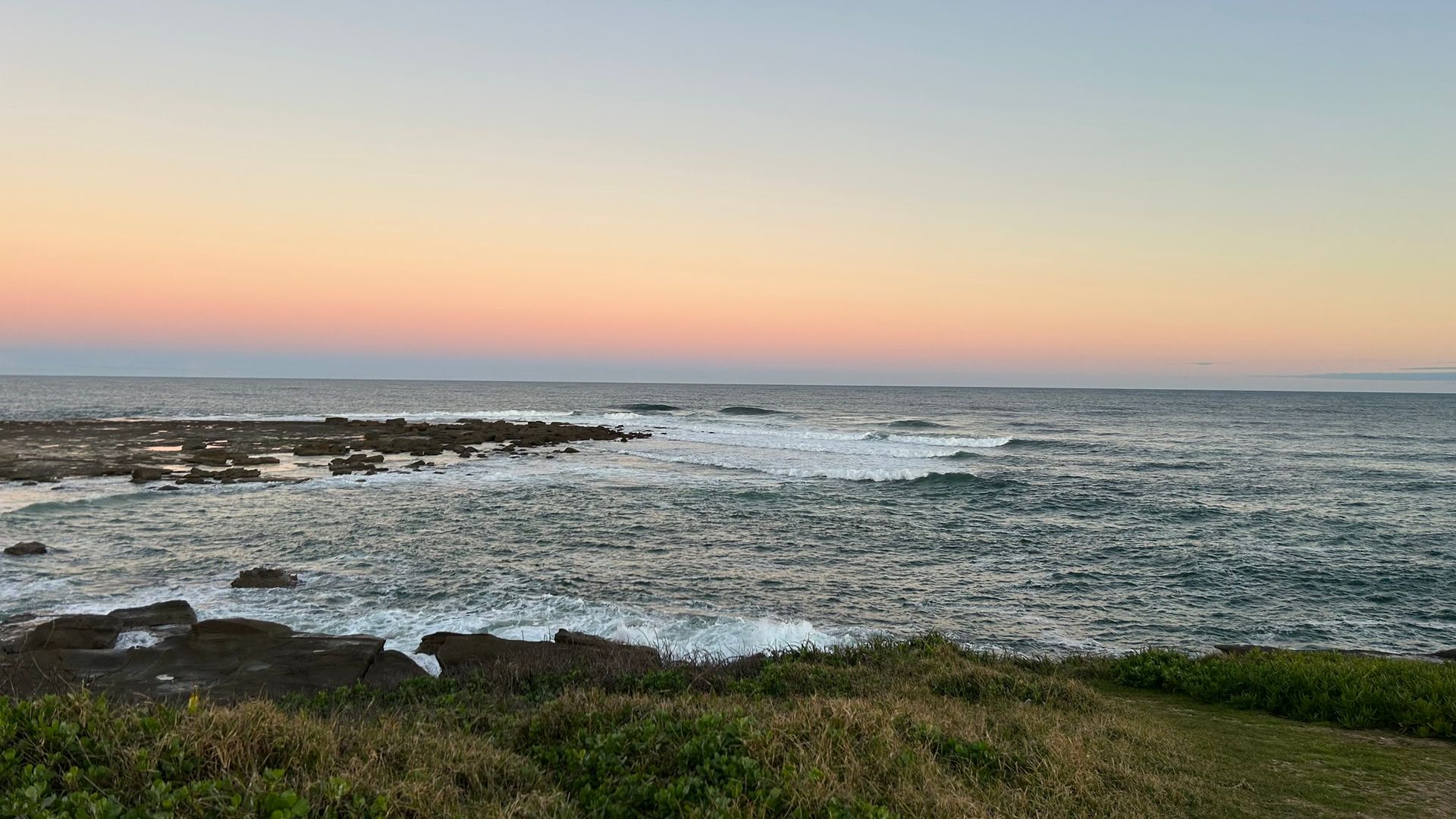Wooden Pier Extending Into Calm Water At Sunset — NLJ Partners P/L In Wyong, NSW