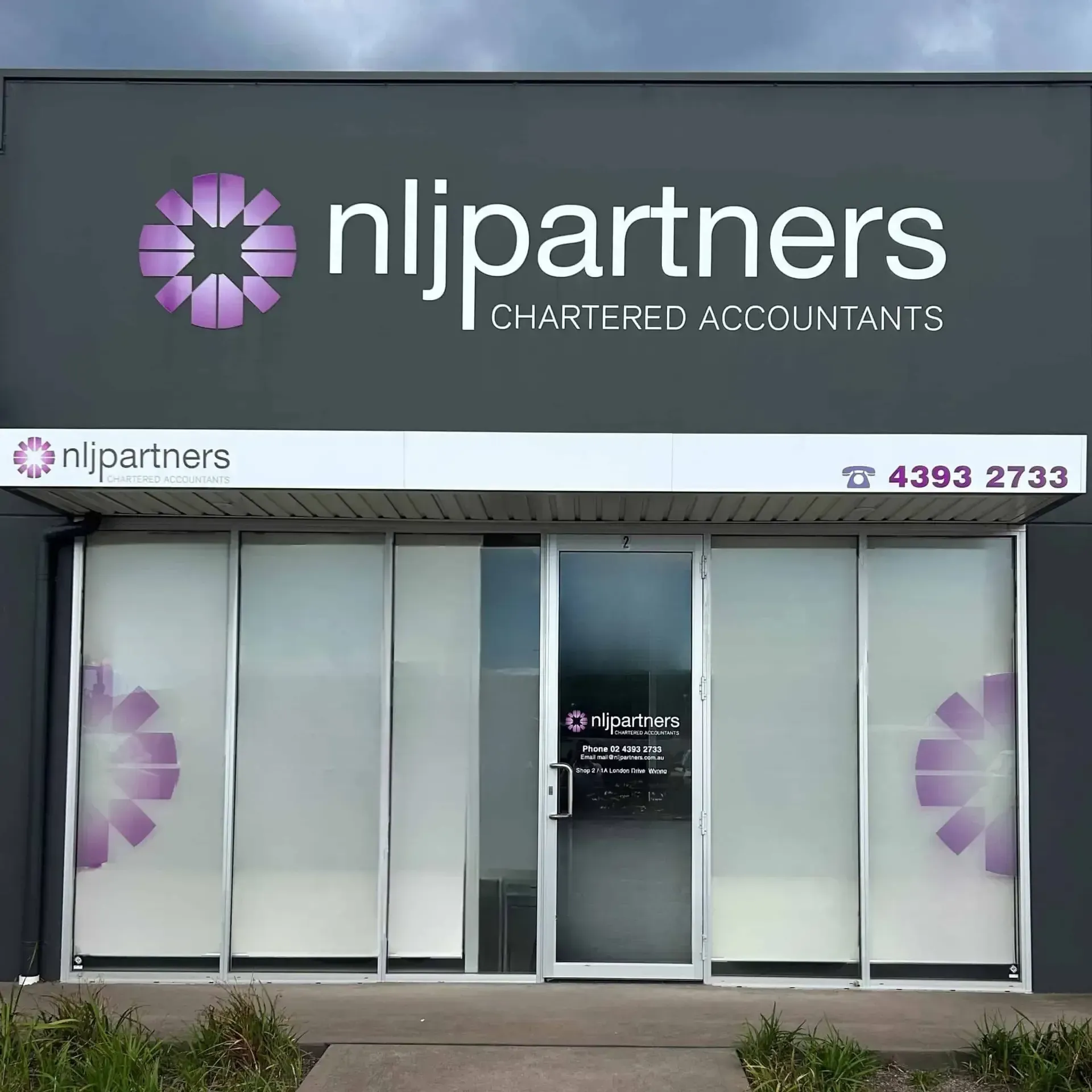 The Front of a Building That Says Nl Partners Chartered Accountants — NLJ Partners P/L In Wyong, NSW