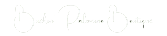 Buckles Palomino Boutique logo in a delicate, handwritten style.