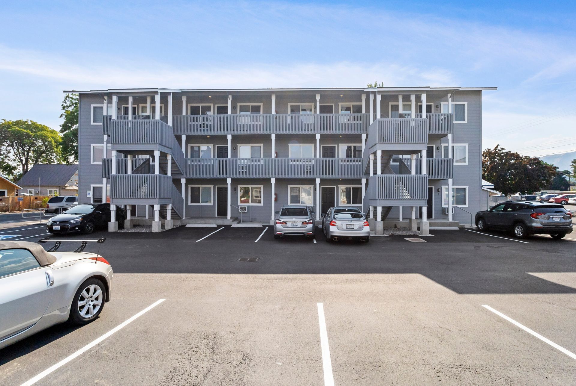 A building with cars parked in front of it