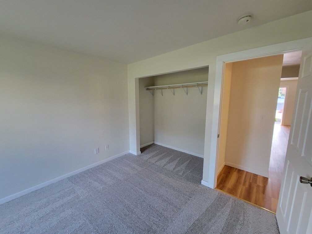 There is a closet in the middle of the room.