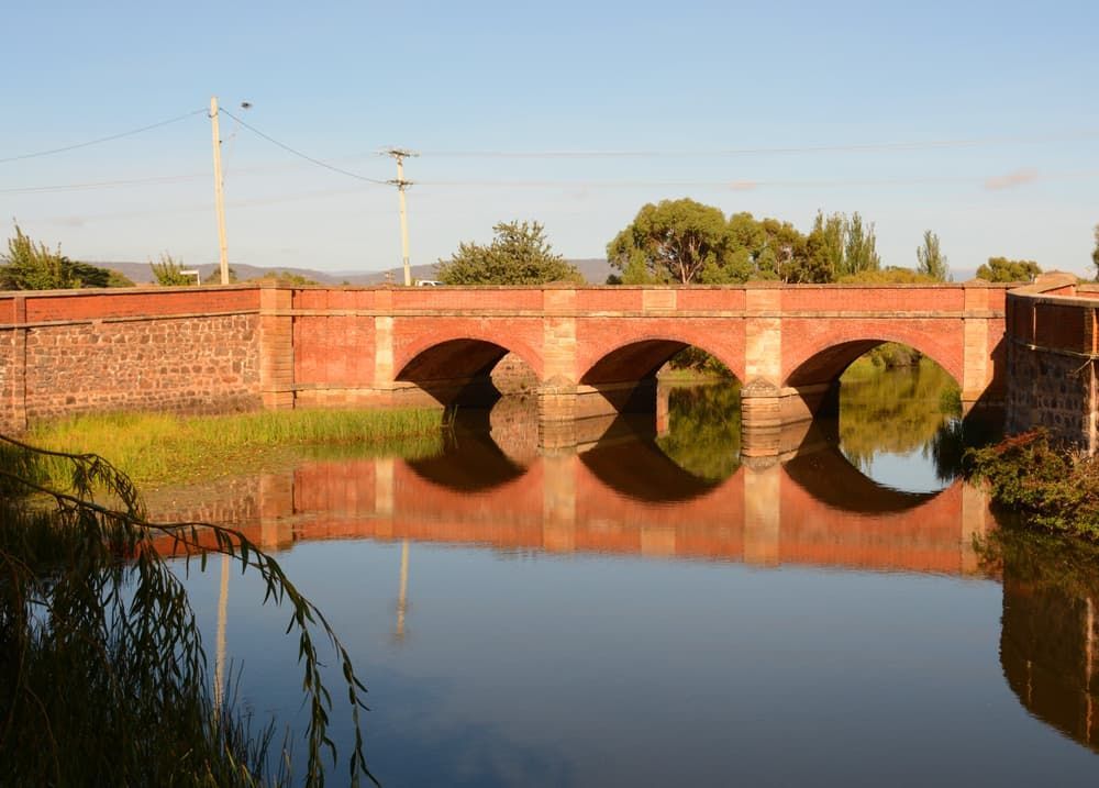 A Brick Bridge Over a Body of Water — JNQ Solar & Electrical in Campbelltown, NSW