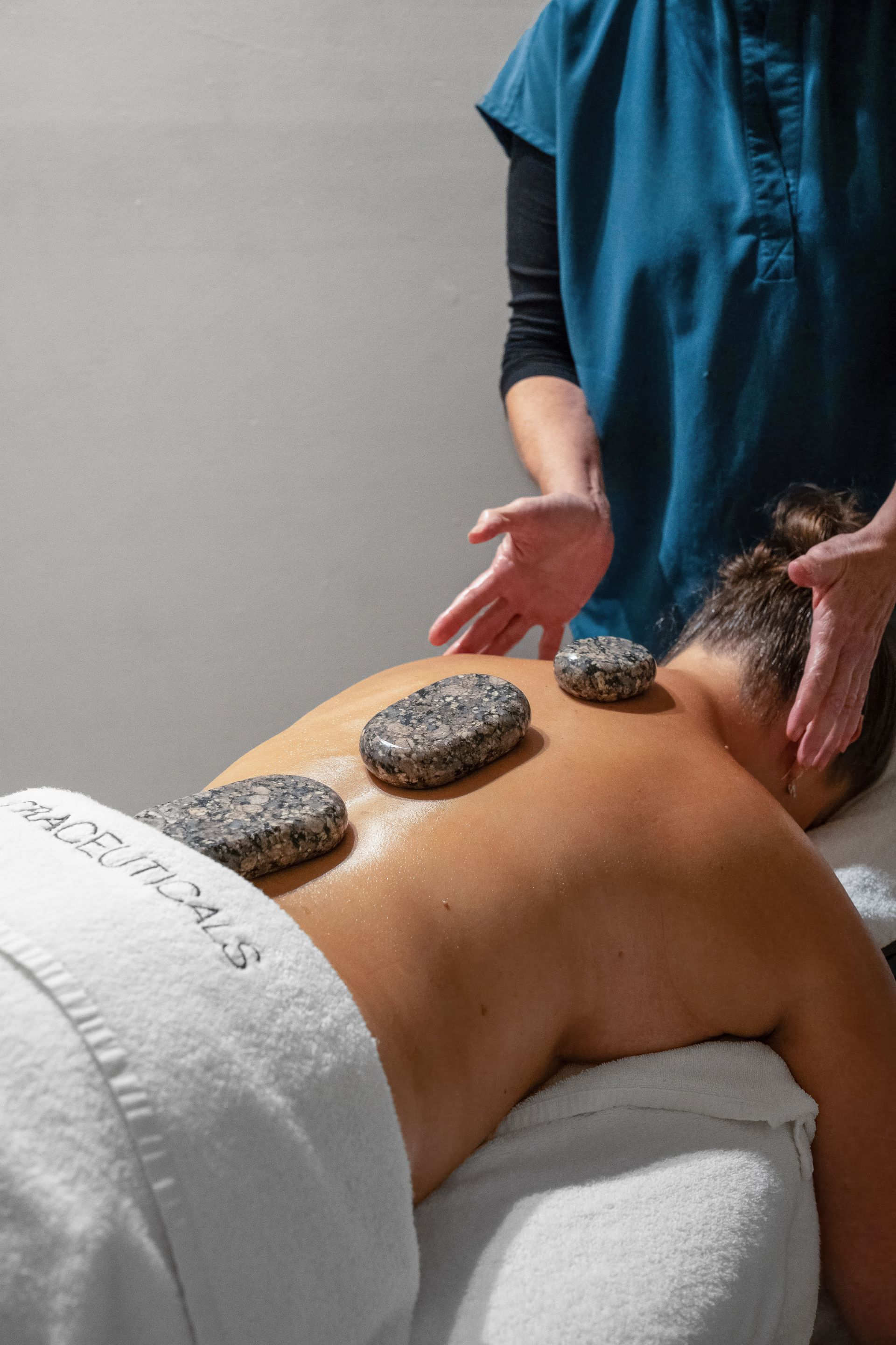Person is Massaging Woman's Back — Aqua Marine Skin and Beauty in Tuncurry, NSW
