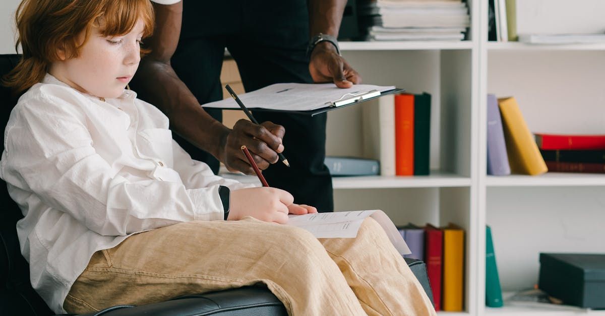 little boy talking to a family therapist