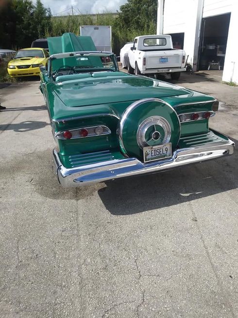 A green classic car
