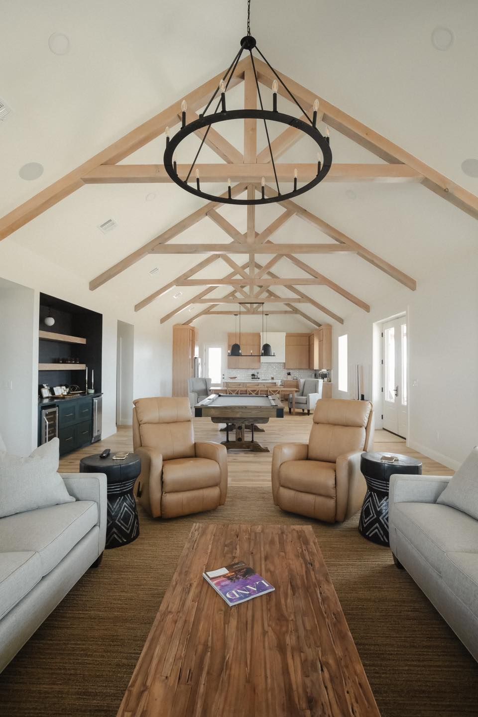 A living room filled with furniture and a chandelier