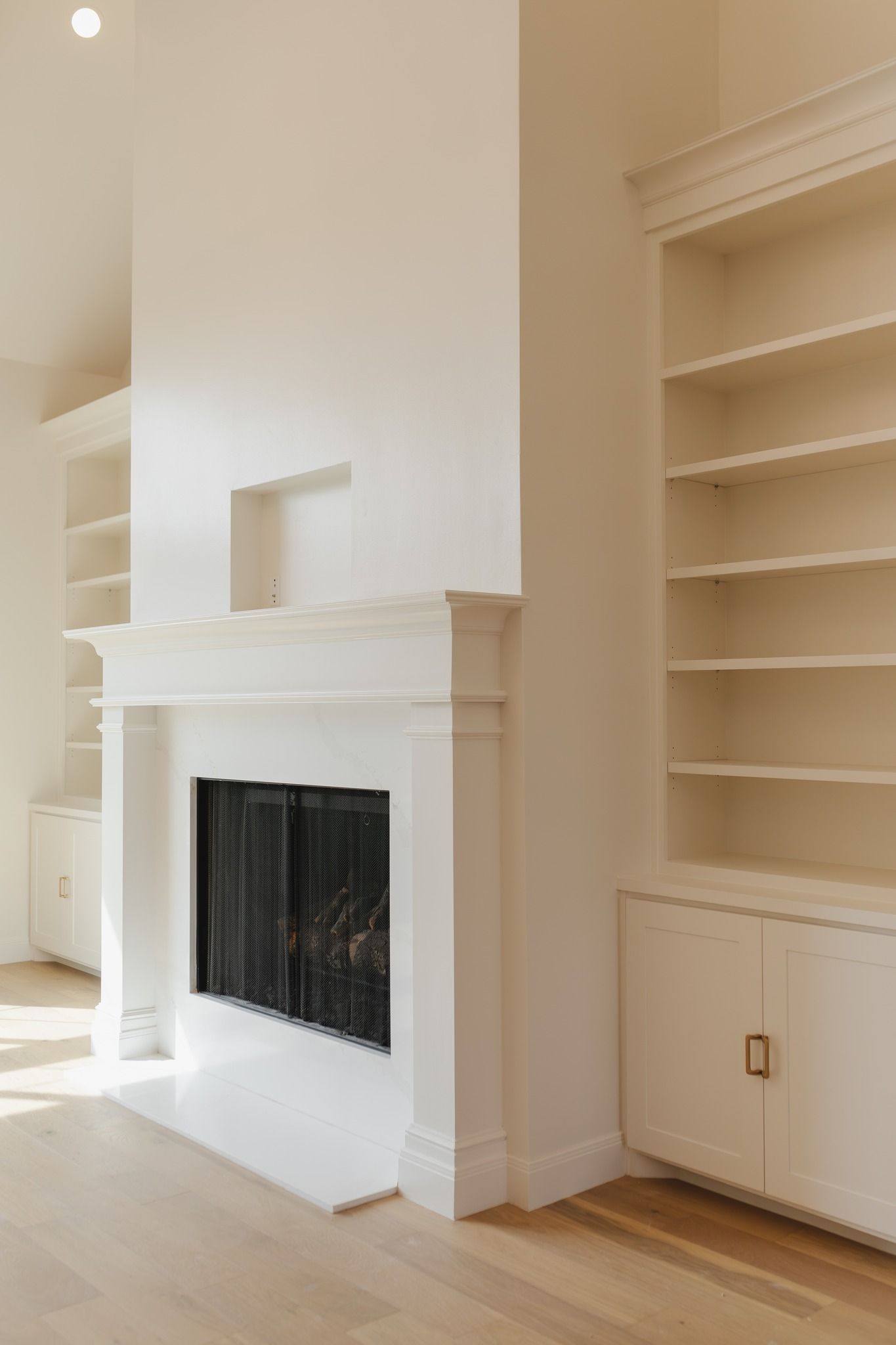 There is a fireplace in the middle of the room.