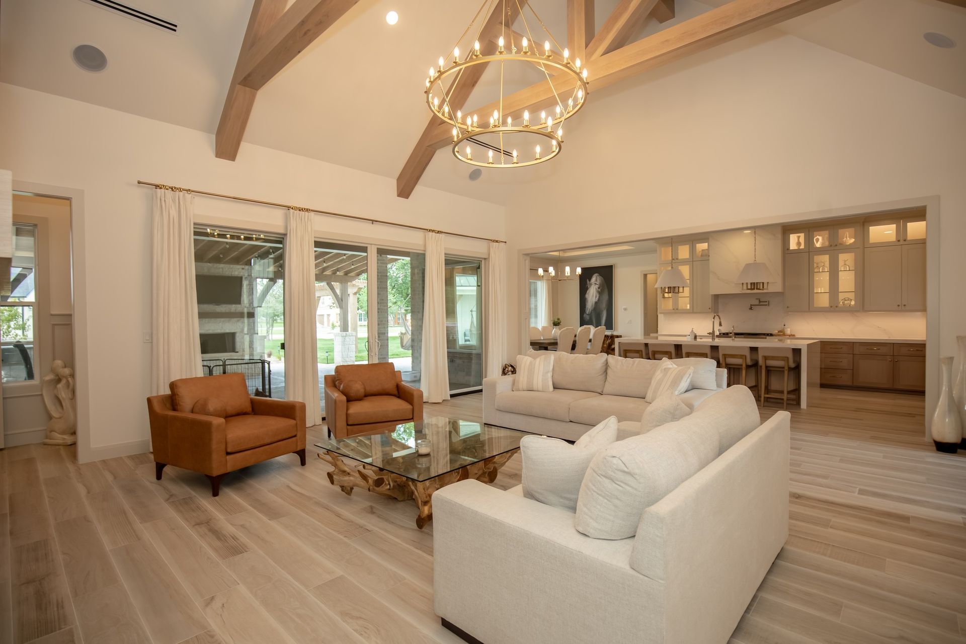 A living room filled with furniture and a chandelier.