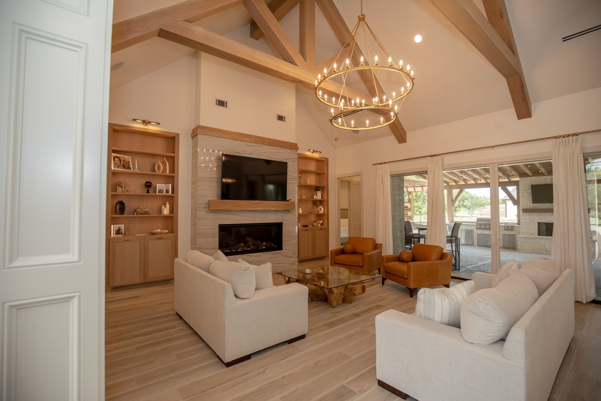 A living room filled with furniture and a fireplace.