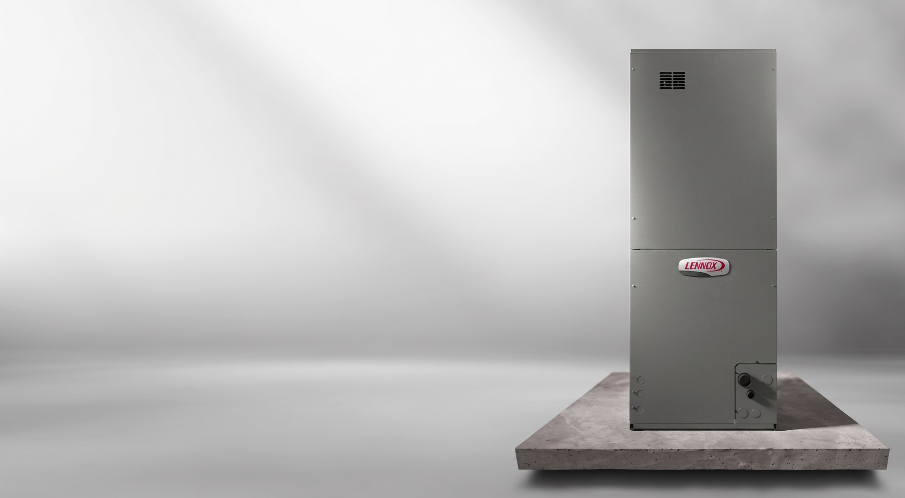 Gray metal industrial cabinet on a wooden platform against a plain light-gray background.