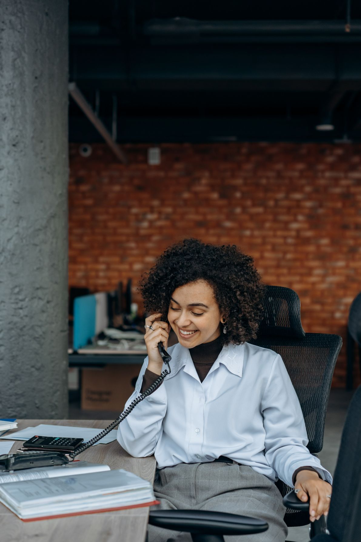 A Woman on a Phone Call — Telecommunications in Noosaville, QLD