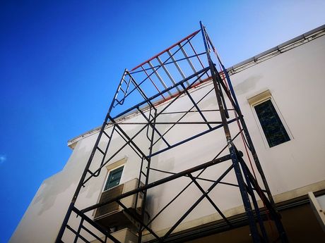 a scaffolding leaning on the building
