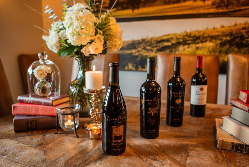 Four bottles of Parrish wine presented on a table for Library Dinner