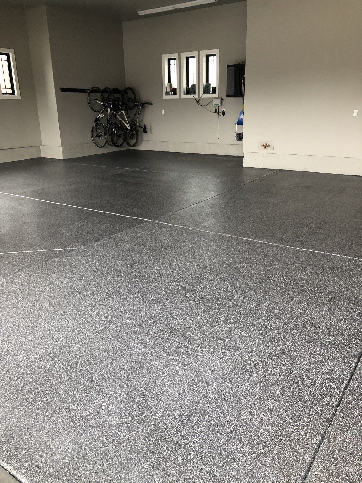 Empty Room with Bike — Silverthorne, CO — K J M Floor Store