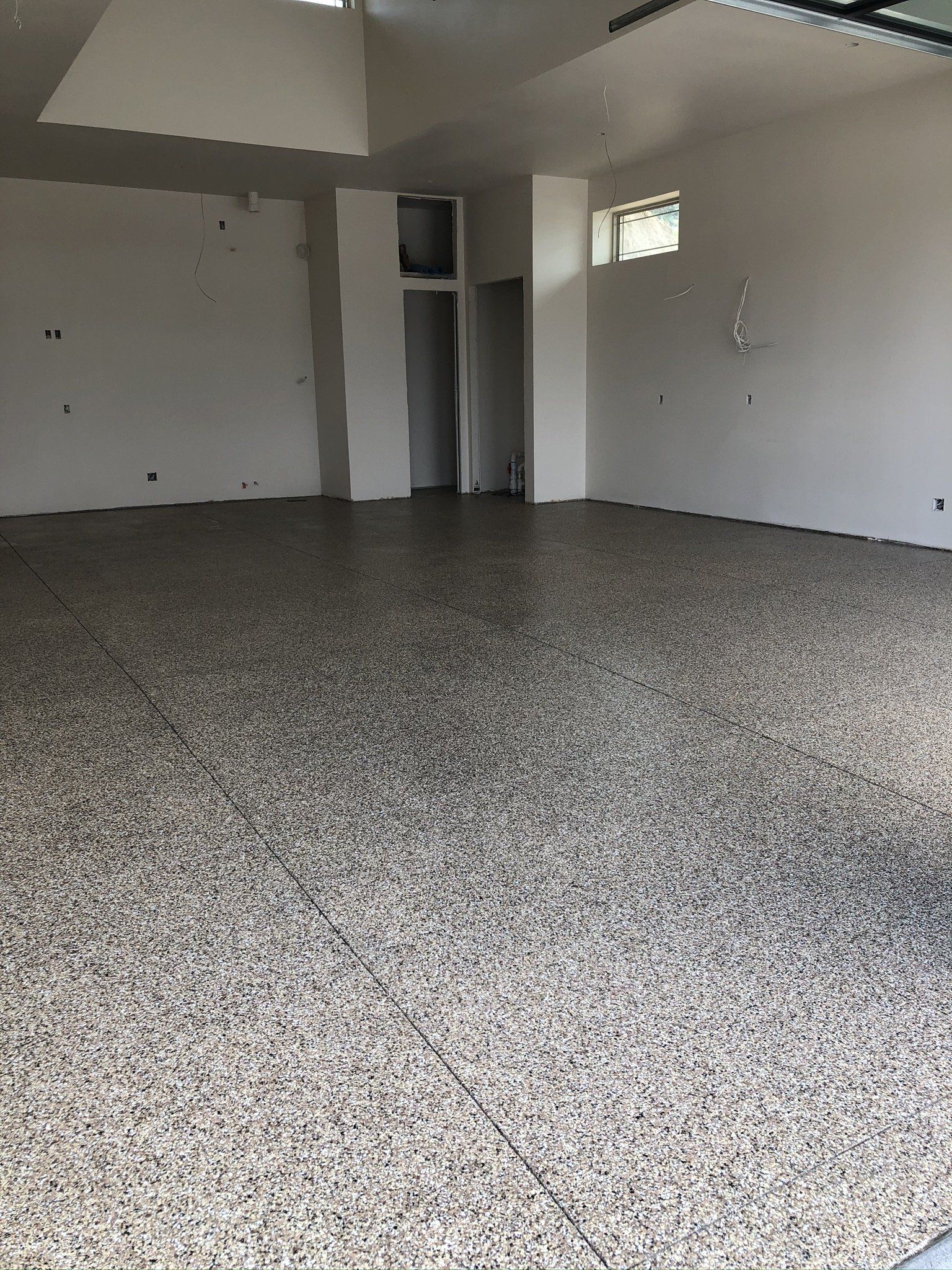 Empty Concrete Floor — Silverthorne, CO — K J M Floor Store