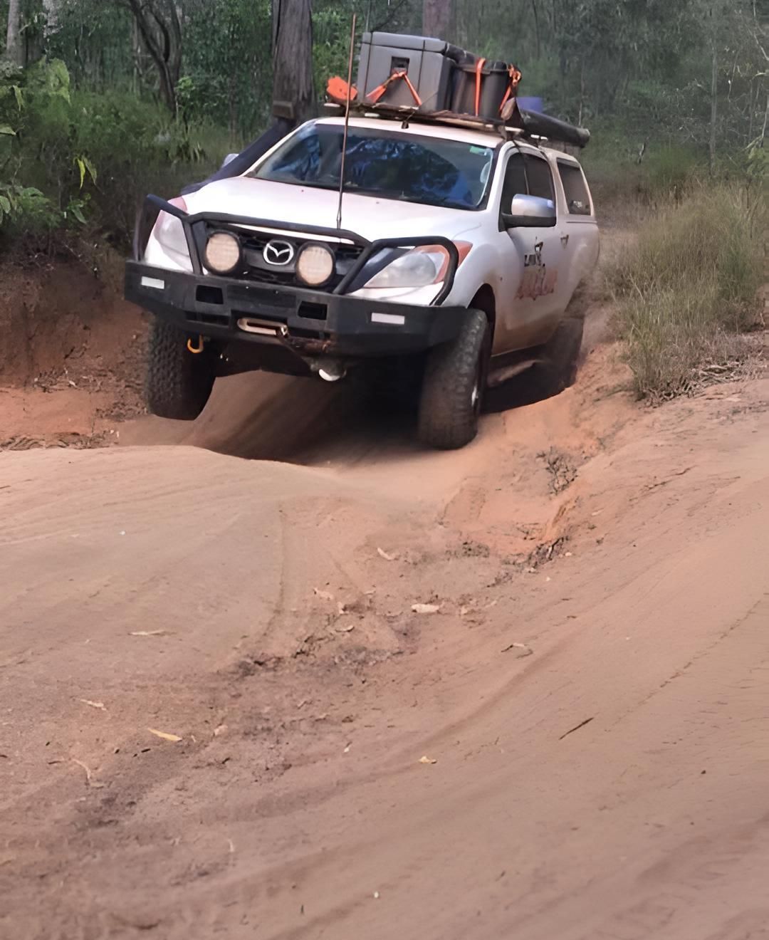 A White Suv Is Driving Down —  Clarkys Auto In Care Ballina, NSW