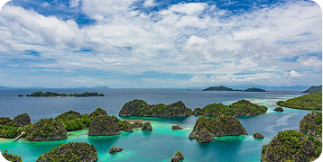 An aerial view of a group of islands in the middle of the ocean.