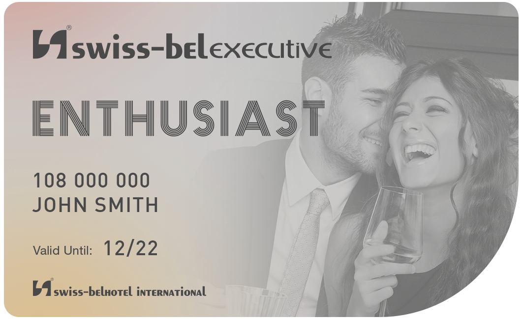 A swiss-belexecutive enthusiast credit card with a man kissing a woman on the cheek