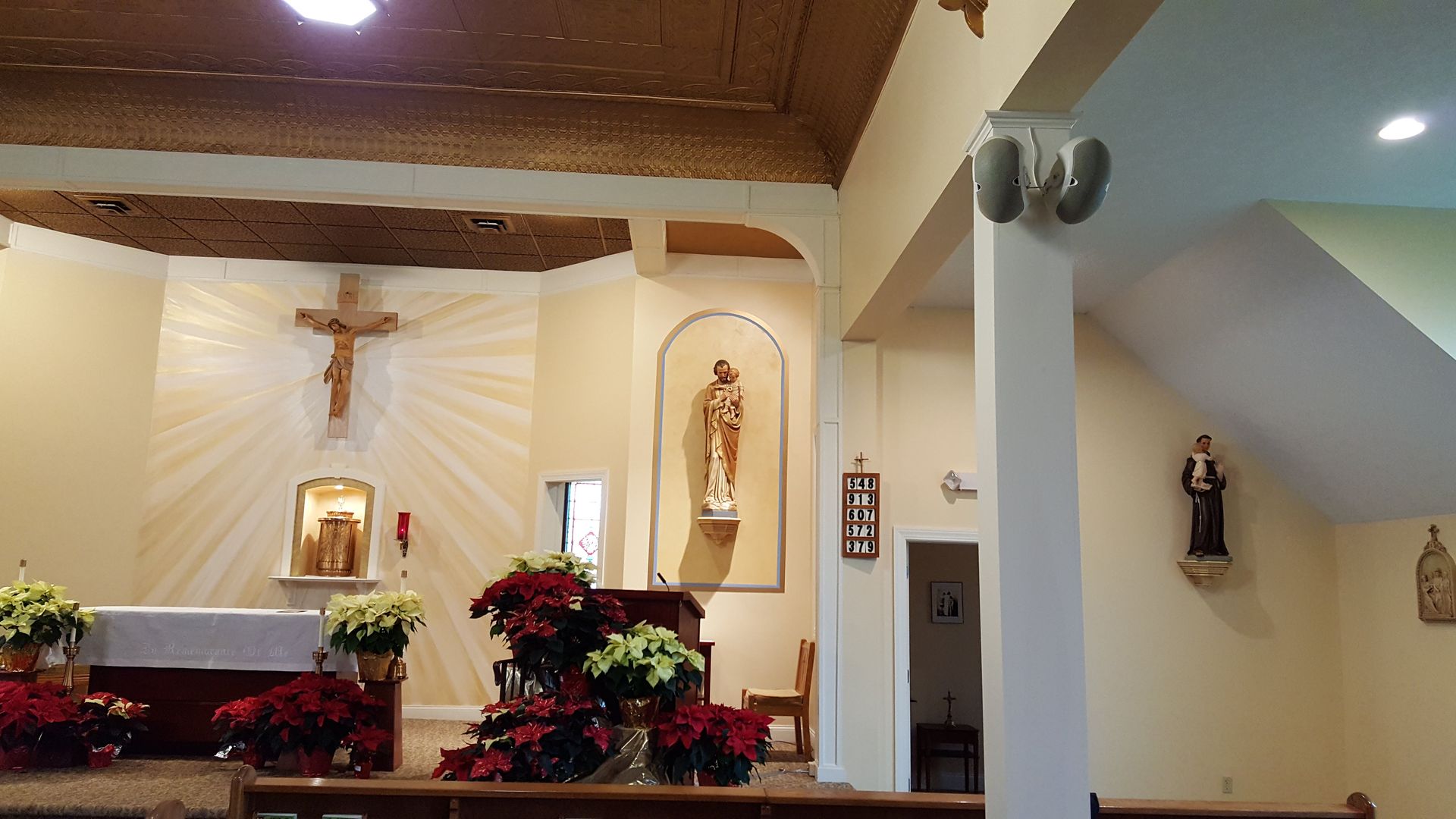 the inside of a church with new speakers installed on the post in northern ohio