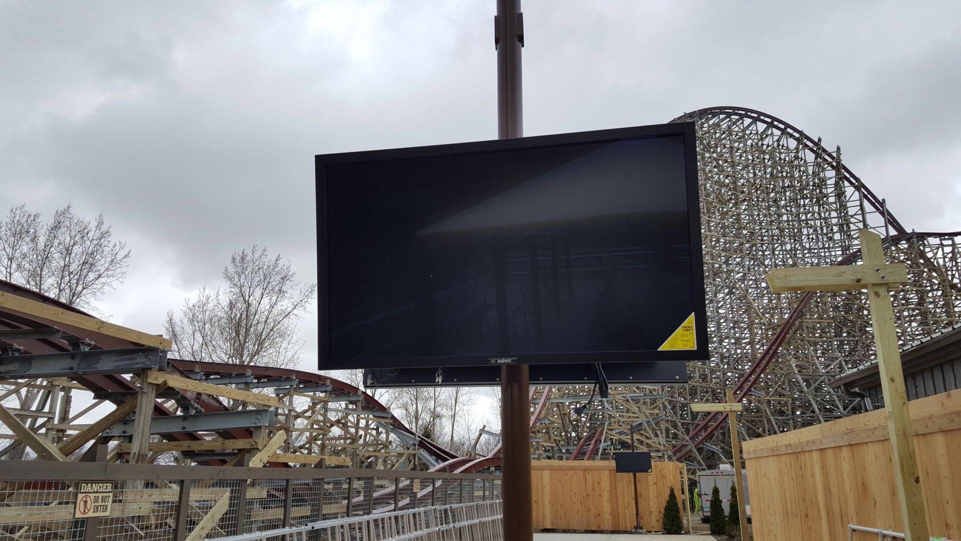 a large tv is mounted on a pole in front of a steel vengeance in northern ohio