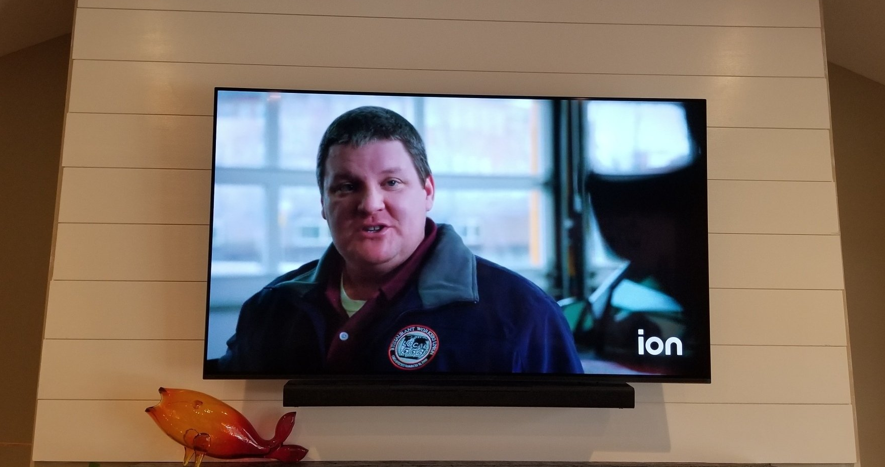a TV and soundbar is mounted on the wall in north central ohio