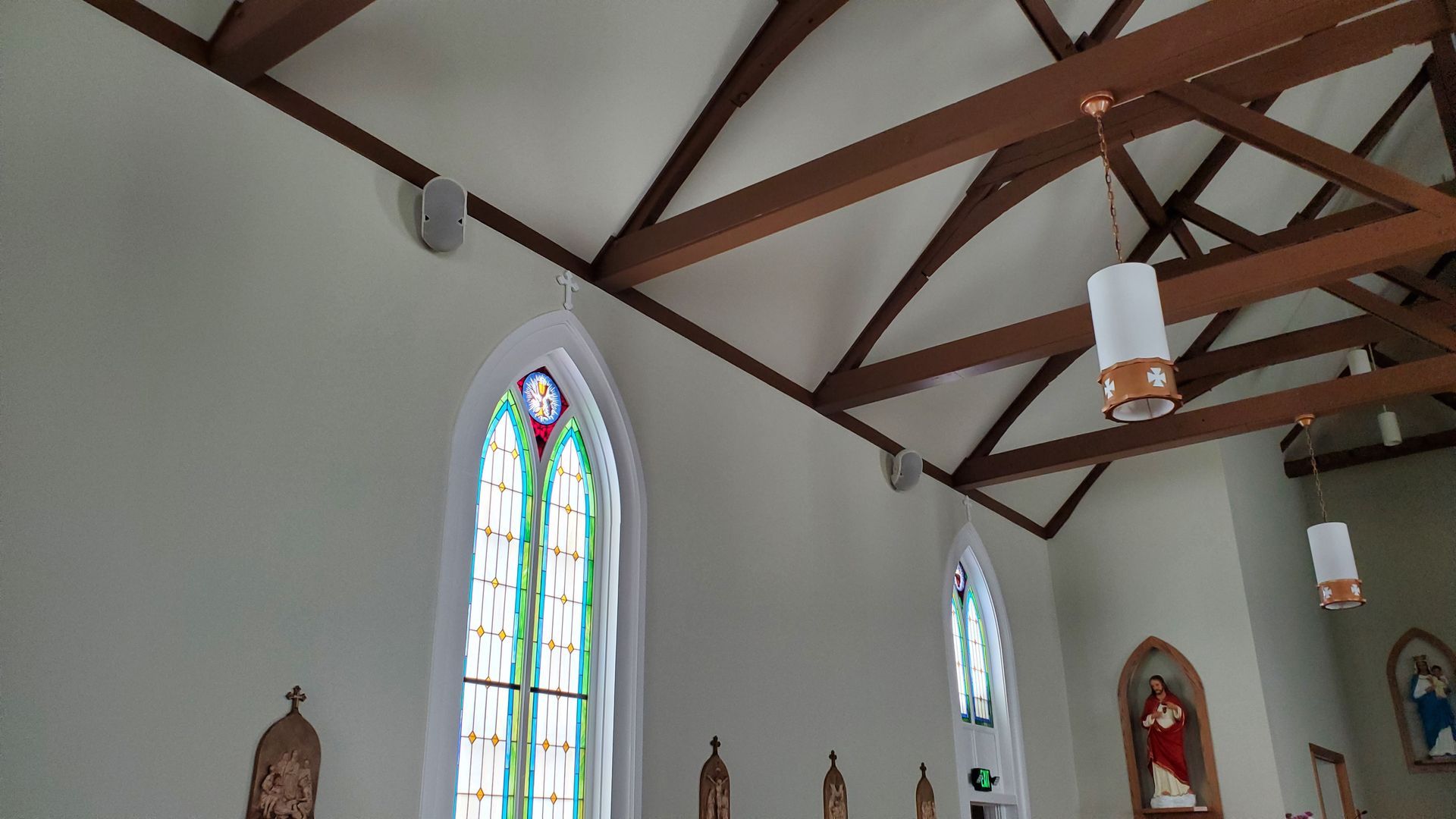 the inside of a church with stained glass windows and a new audio system installed in northern ohio