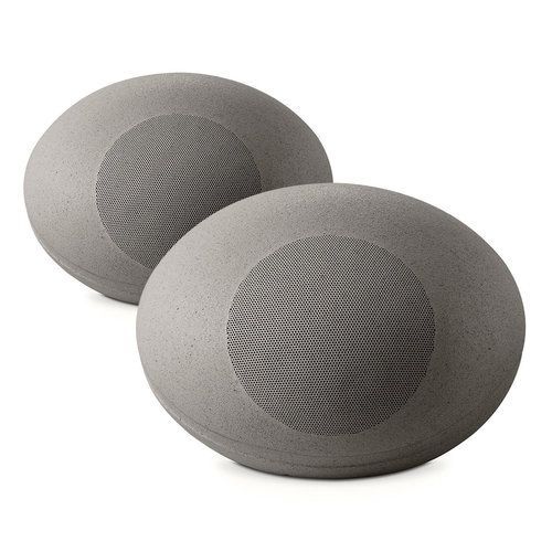 a pair of concrete rock speakers sitting next to each other on a white surface.