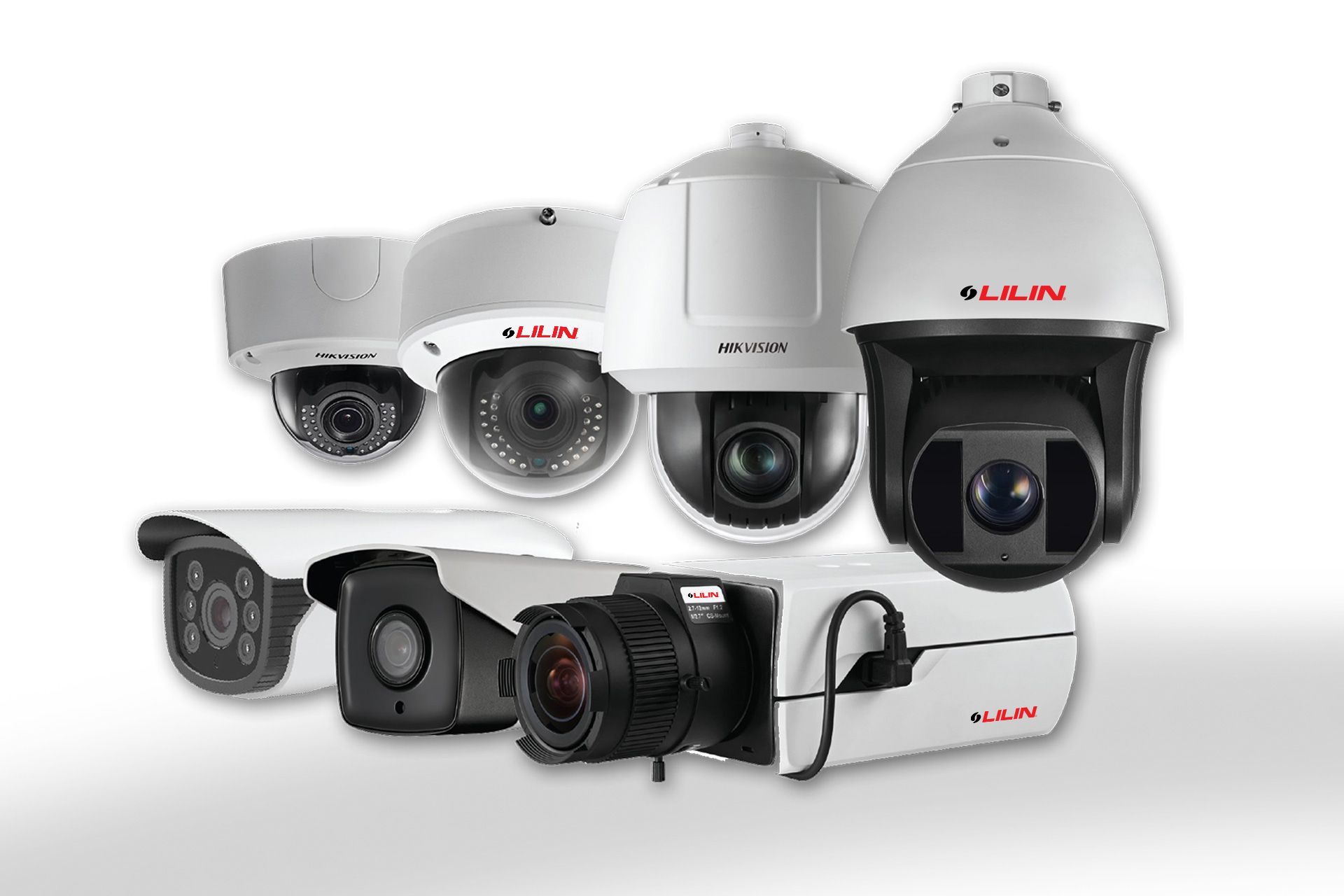 A bunch of security cameras are lined up on a white background