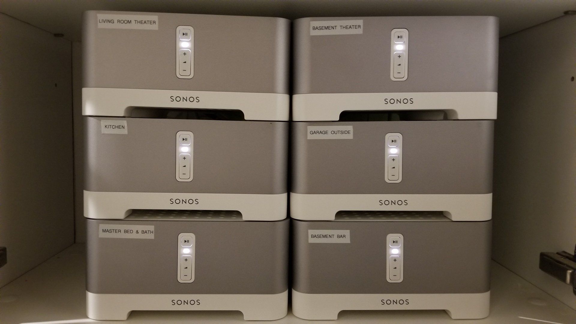 six sonos amps are stacked on top of each other installed by fisher electronics in northern ohio.