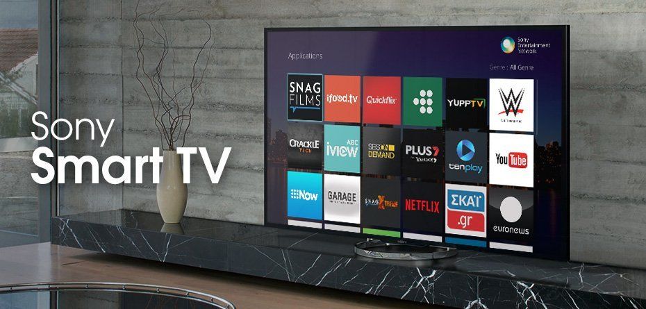 a sony smart tv is displayed in a living room with apps on the tv screen