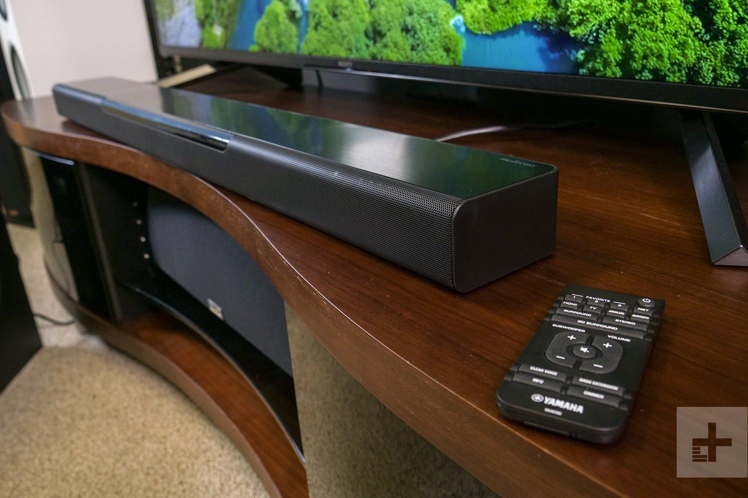 Yamaha soundbars connected to a TV for audio