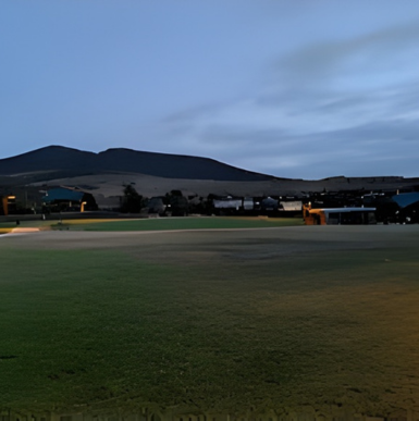 Open green fields with playgrounds and walking paths at 4S Ranch Community Park