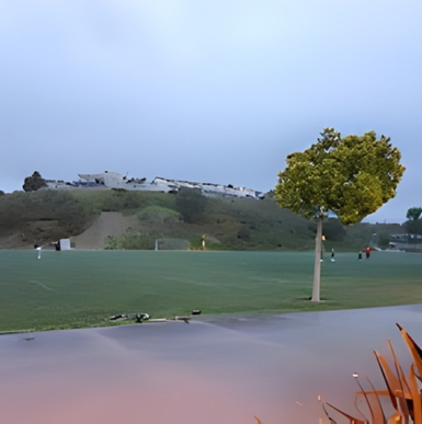 Sports fields with players and spectators at 4S Ranch Sports Park