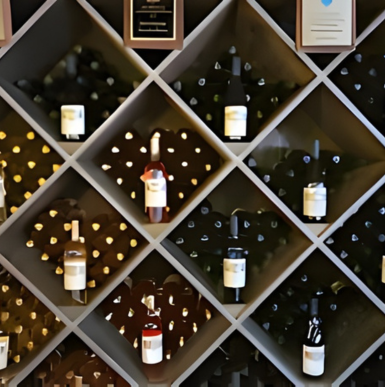 Outdoor wine tasting area at Bernardo Winery with rustic buildings and lush gardens.
