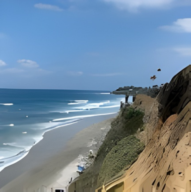 Coastal cliffs and sandy beaches with waves crashing along the Encinitas coastline