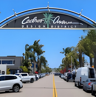 Shoppers walking along boutique stores and outdoor dining at Cedros Collective Mall