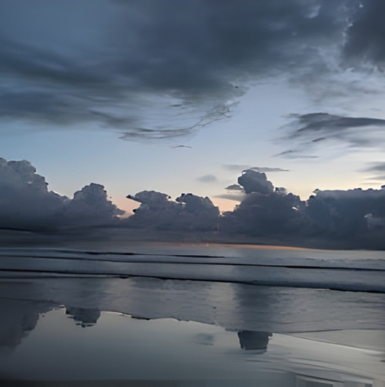 Sandy beach with walking paths, cliffs, and ocean waves at Fletcher Cove Beach Park