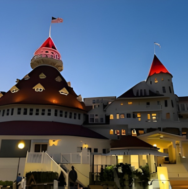 Historic beachfront hotel with Victorian architecture and red roof at Hotel del Coronado