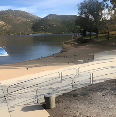 Lake Poway with fishing dock, surrounding hills, and walking trails.