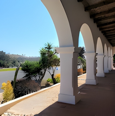 Historic stone church and courtyard at Mission San Luis Rey in Oceanside