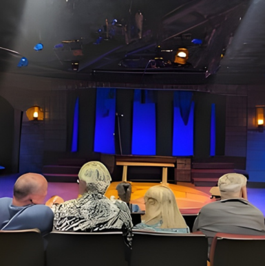 Facade of North Coast Repertory Theatre with marquee and entrance steps