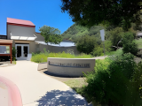 Entrance of Tecolote Canyon Natural Park and Nature Center with greenery