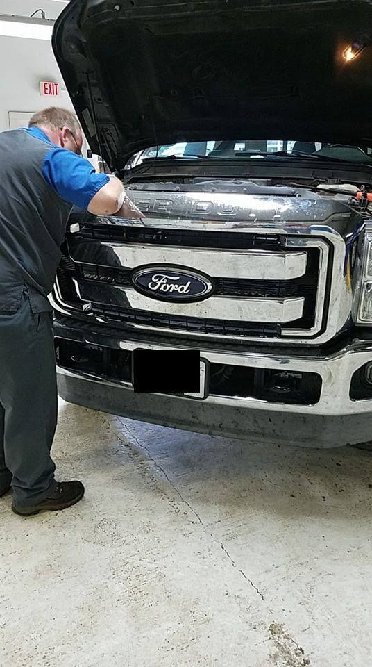 Man Checking Truck — Plymouth, WI — JDL Detailing