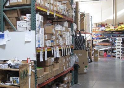 A warehouse filled with lots of boxes and shelves