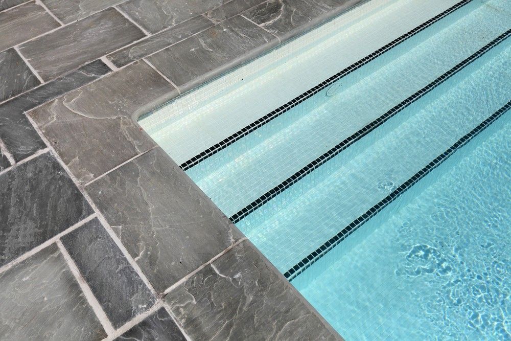 Pool Steps Leading Into Clear Blue Water — Coastcrete Concrete Specialist in Lemon Tree Passage, NSW